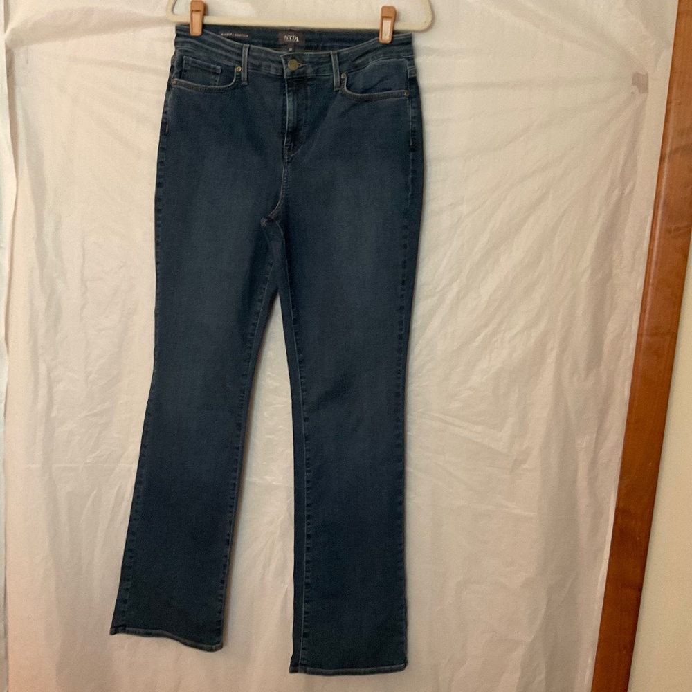 Woman jeans almost new bootcut  lift and tuck technology size 10